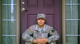 military woman on porch