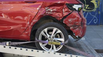 Damaged vehicle after a car accident involving shared fault in Oklahoma.