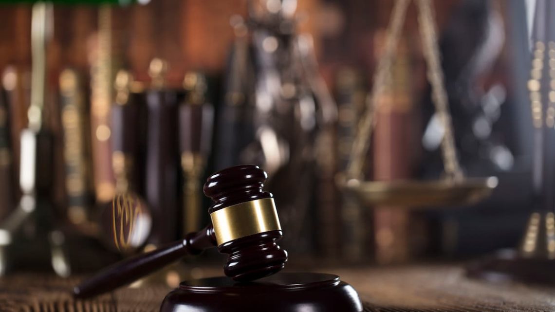 Courtroom gavel and scales of justice representing criminal law