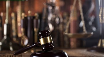 Courtroom gavel and scales of justice representing criminal law