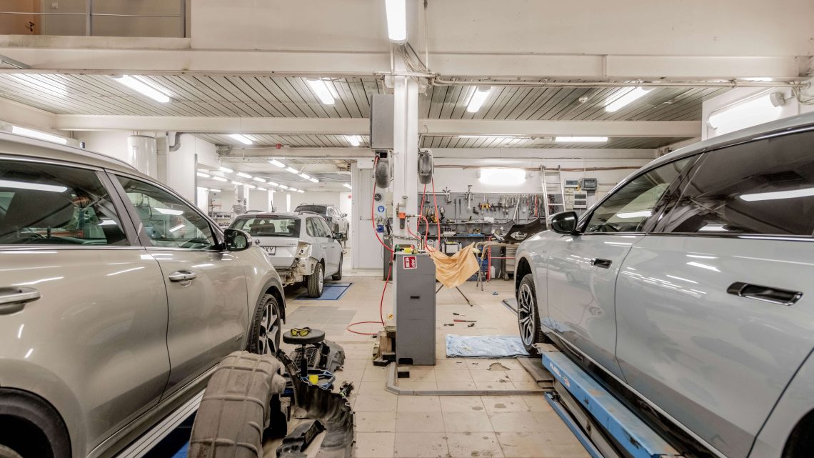 Multiple Cars in a Mechanic's Shop